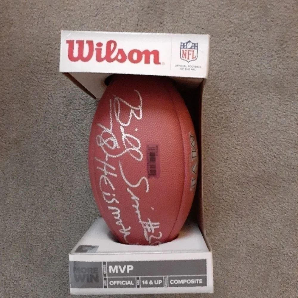 Billy Sims autographed brand new Wilson football.